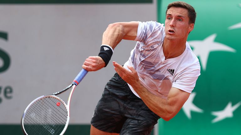 Joe Salisbury of Great Britain serves playin g with Rajeev Ram of the United States during their mens first round match against Salvatore Caruso of Italy and Davidovich Fokina of Spain during day five of the 2021 French Open at Roland Garros on June 03, 2021 in Paris, France. (Photo by Julian Finney/Getty Images)