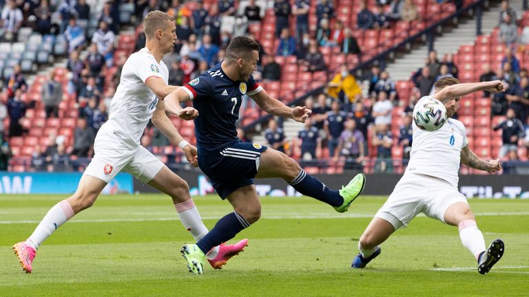 Scotland's John McGinn gets a shot away