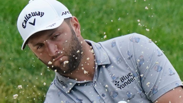 Jon Rahm hits from the bunker on the 10th green during the first round of the Memorial golf tournament, Thursday, June 3, 2021, in Dublin, Ohio. (AP Photo/Darron Cummings)