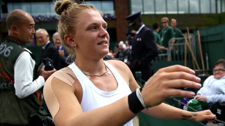 Jordanne Whiley reacts after victory in the the Ladies Wheelchair Doubles Final on day thirteen of the Wimbledon Championships at the All England Lawn Tennis and Croquet Club, Wimbledon.