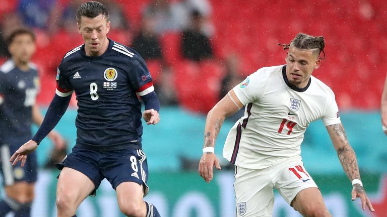 Callum McGregor and Kalvin Phillips battle for the ball during England vs Scotland