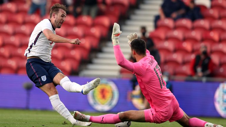 Harry Kane is denied by Austria goalkeeper Daniel Buchmann 