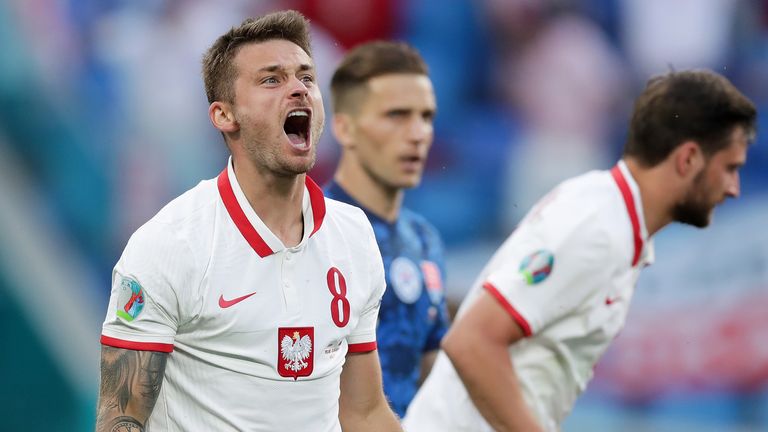 Karol Linetty of Poland celebrates after scoring against Slovakia
