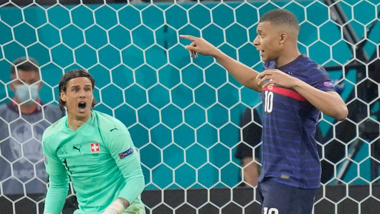 Kylian Mbappe has his decisive penalty kick saved by Switzerland's Yan Sommer