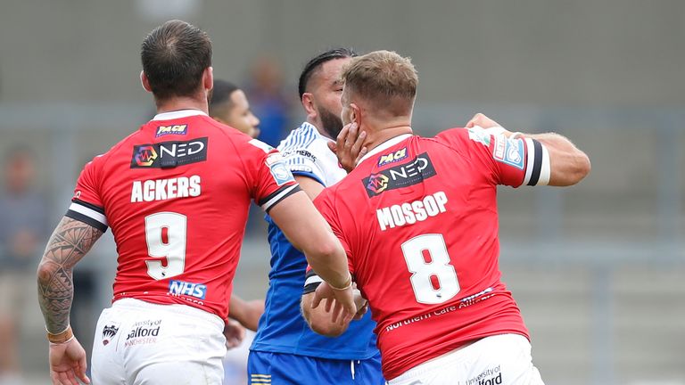 Lee Mossop punches Leeds Rhinos' Konrad Hurrell and is sent off for the offence