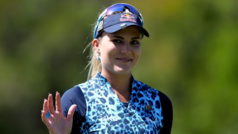 Lexi Thompson smiles as she walks down the first fairway during the final round of the U.S. Women's Open golf tournament at The Olympic Club, Sunday, June 6, 2021, in San Francisco. (AP Photo/Jed Jacobsohn)