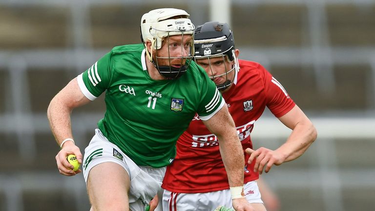 Cian Lynch of Limerick in action against Daire Connery of Cork
