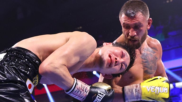 LAS VEGAS, NEVADA - JUNE 26: Masayoshi Nakatani (L) and Vasiliy Lomachenko (R) exchange punches during their fight at Virgin Hotels Las Vegas on June 26, 2021 in Las Vegas, Nevada. (Photo by Mikey Williams/Top Rank Inc via Getty Images)