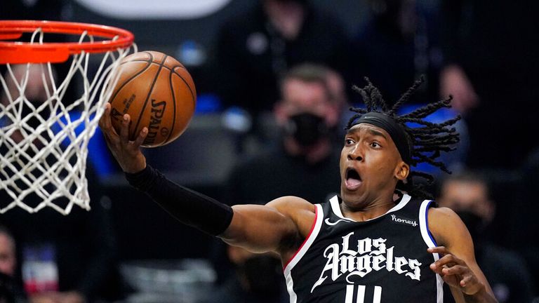 Los Angeles Clippers guard Terance Mann shoots during the second half in Game 6 of a second-round NBA basketball playoff series against the Utah Jazz Friday, June 18, 2021, in Los Angeles. (AP Photo/Mark J. Terrill)