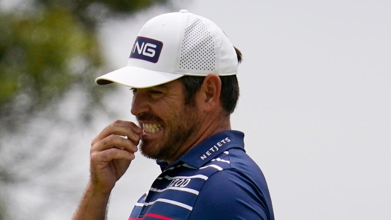 Louis Oosthuizen, of South Africa, reacts after missing his putt on the first green during the final round of the U.S. Open Golf Championship, Sunday, June 20, 2021, at Torrey Pines Golf Course in San Diego. (AP Photo/Gregory Bull)