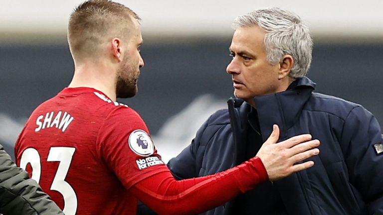 Luke Shaw embraces his former manager Jose Mourinho (PA)