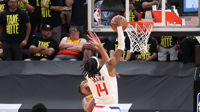 Terance Mann #14 of the LA Clippers dunks the ball during the game against the Utah Jazz during Round 2, Game 5 of the 2021 NBA Playoffs on June 16, 2021 at vivint.SmartHome Arena in Salt Lake City, Utah. 