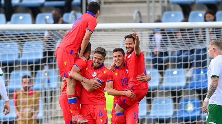 Marc Vales of Andorra celebrates with team-mates after scoring 