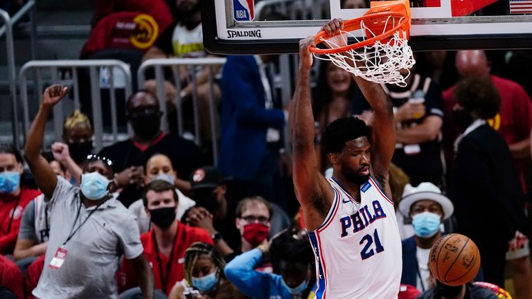 Philadelphia 76ers center Joel Embiid dunks during the second half of Game 3 of the team&#39;s second-round NBA basketball playoff series against the Atlanta Hawks, Friday, June 11, 2021, in Atlanta.