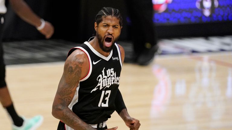 Los Angeles Clippers guard Paul George celebrates after scoring during the first half in Game 3 of the NBA basketball Western Conference Finals against the Phoenix Suns Thursday, June 24, 2021, in Los Angeles. (AP Photo/Mark J. Terrill)


