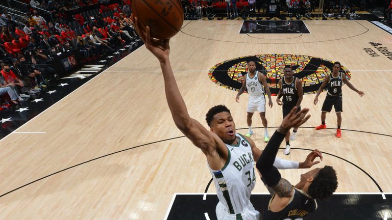 iannis Antetokounmpo #34 of the Milwaukee Bucks dunks the ball against the Atlanta Hawks during Game 4 of the Eastern Conference Finals of the 2021 NBA Playoffs on June 29, 2021 at State Farm Arena in Atlanta, Georgia. 