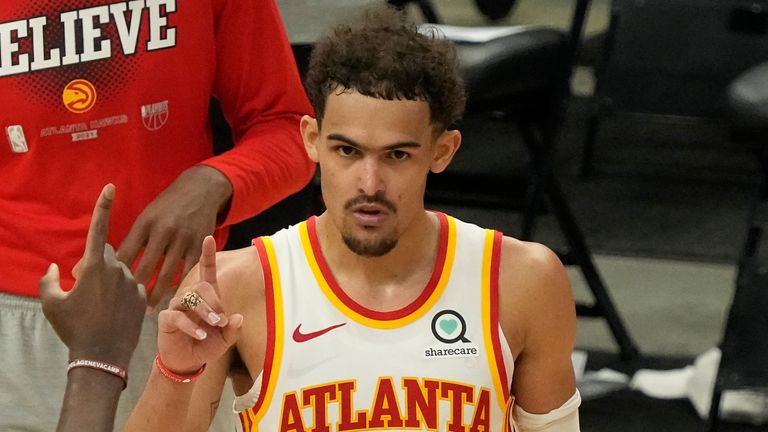 Atlanta Hawks&#39; Trae Young and Clint Capela celebrate after Game 1 of the NBA Eastern Conference basketball finals game against the Milwaukee Bucks Wednesday, June 23, 2021, in Milwaukee. The Hawks won 116-113 to take a 1-0 lead in the series. (AP Photo/Morry Gash)


