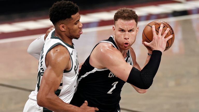 Brooklyn Nets forward Blake Griffin (2) looks to pass around Milwaukee Bucks forward Giannis Antetokounmpo (34) during the second half of Game 1 of an NBA basketball second-round playoff series Saturday, June 5, 2021, in New York.