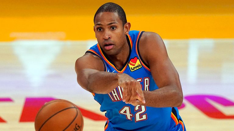Oklahoma City Thunder center Al Horford passes the ball during the second half of an NBA basketball game against the Los Angeles Lakers Monday, Feb. 8, 2021, in Los Angeles. The Lakers won 119-112 in overtime. (AP Photo/Mark J. Terrill)