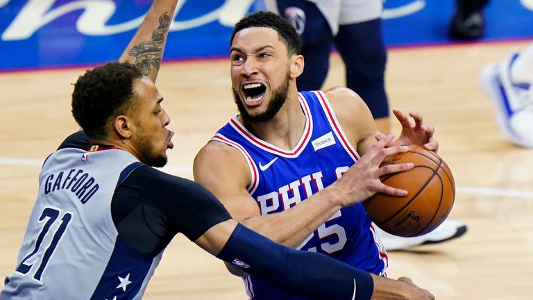 Philadelphia 76ers&#39; Ben Simmons, right, tries to get a shot past Washington Wizards&#39; Daniel Gafford during the first half of Game 5 in a first-round NBA basketball playoff series, Wednesday, June 2, 2021, in Philadelphia.