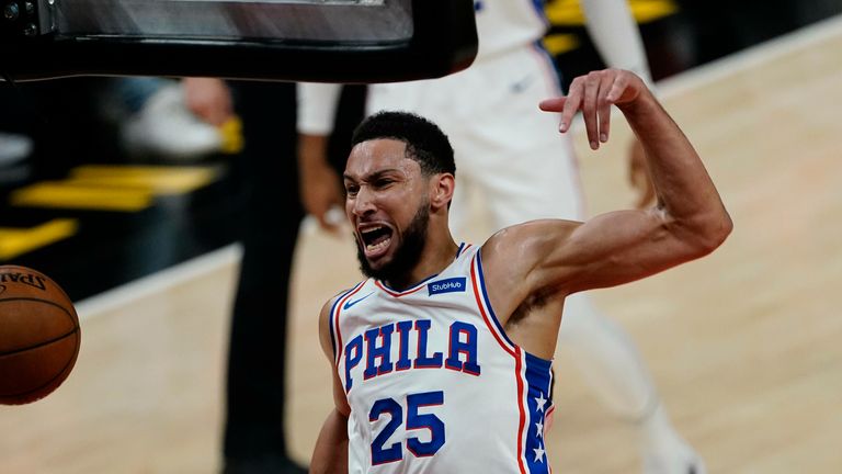 Philadelphia 76ers guard Ben Simmons (25) scores during the first half of Game 3 of a second-round NBA basketball playoff series against the Atlanta Hawks, Friday, June 11, 2021, in Atlanta.