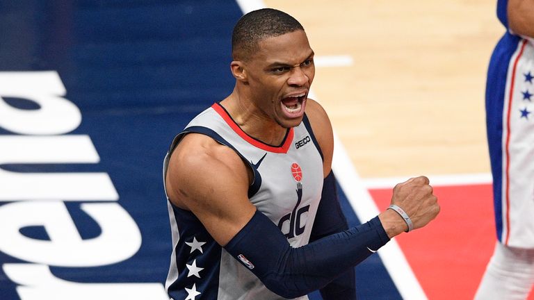 Washington Wizards guard Russell Westbrook (4) reacts after he scored and was fouled by Philadelphia 76ers guard George Hill (not shown) during the first half of Game 3 in a first-round NBA basketball playoff series, Saturday, May 29, 2021, in Washington.