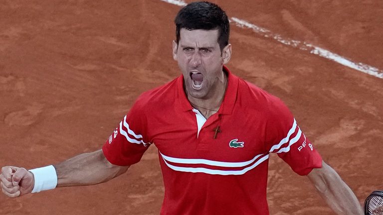 Serbia&#39;s Novak Djokovic celebrates a winning point as he plays Spain&#39;s Rafael Nadal during their semifinal match of the French Open tennis tournament at the Roland Garros stadium Friday, June 11, 2021 in Paris. (AP Photo/Christophe Ena)