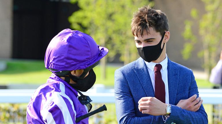 O'Brien talks with jockey Ryan Moore after victory in the Moyglare Stud Stakes