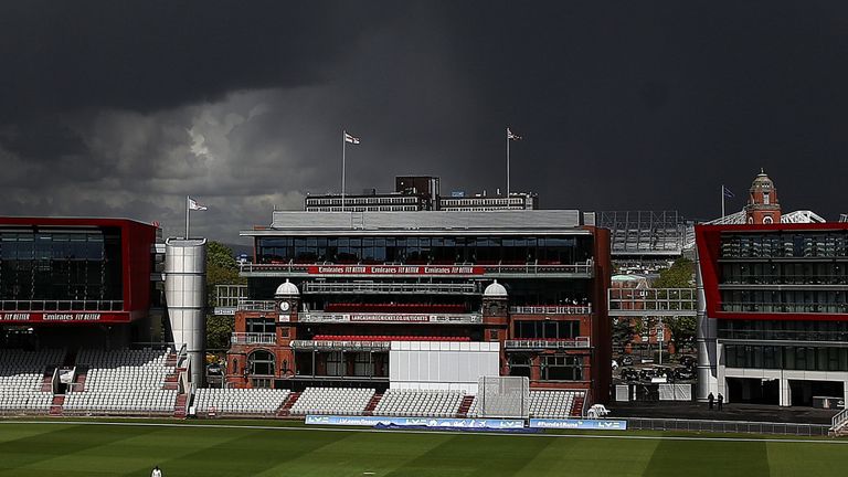 Lancashire's James Anderson bowls to Glamorgan's Kiran Carlson as dark clouds gather over Old Trafford, during day two of the LV = Insurance County Championship match at the Emirates Old Trafford, Manchester. Picture date: Friday May 7, 2021.
