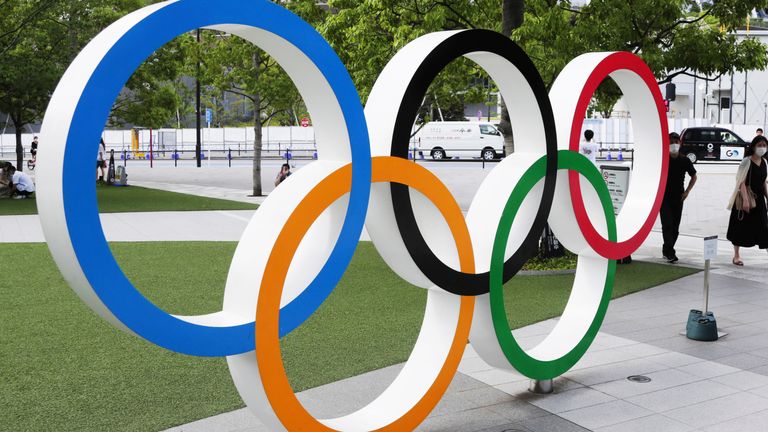 A photo shows a five-ring Olympic emblem in ftont of National Stadium in Shinjuku Ward, Tokyo on May 30, 2021. The Tokyo Olympics, which would be held in 2020, has been postponed to 2021 due to the new coronavirus COVID-19.    ( The Yomiuri Shimbun via AP Images )