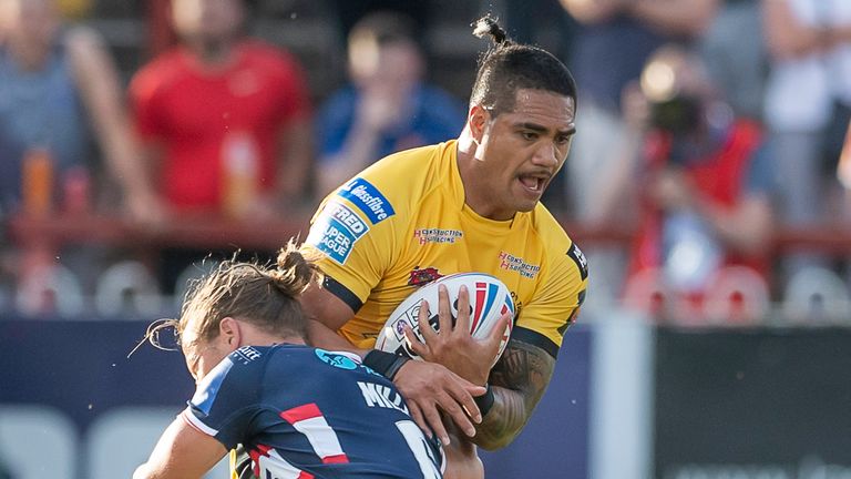 Castleford's Peter Mata'utia is tackled by Wakefield's Jacob Miller.