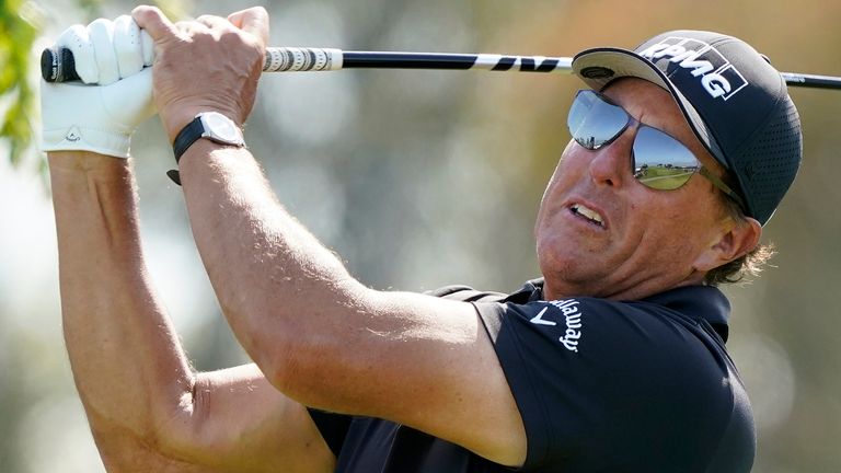 Phil Mickelson plays his shot from the 12th tee during the first round of the U.S. Open Golf Championship, Thursday, June 17, 2021, at Torrey Pines Golf Course in San Diego. (AP Photo/Marcio Jose Sanchez)