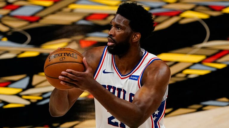 Philadelphia 76ers center Joel Embiid (21) shoots during the first half of Game 6 of an NBA basketball Eastern Conference semifinal series Friday, June 18, 2021, in Atlanta. (AP Photo/John Bazemore)