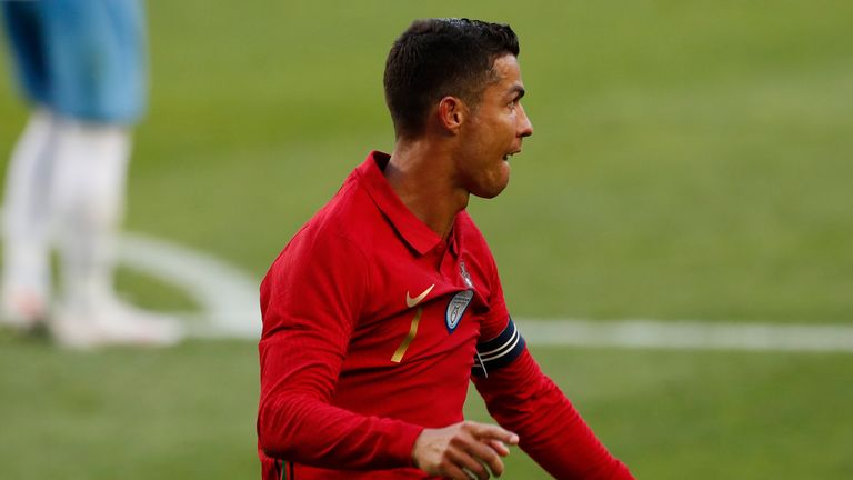 Cristiano Ronaldo celebrates scoring against Israel
