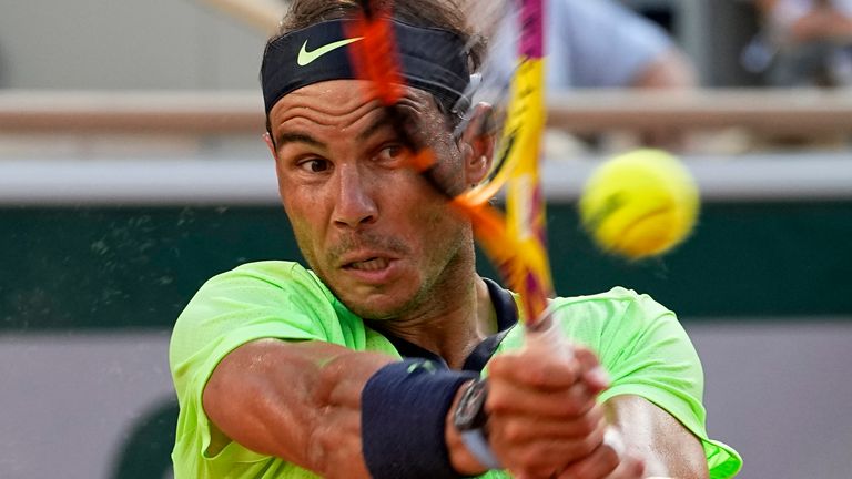 Spain&#39;s Rafael Nadal returns the ball to Serbia&#39;s Novak Djokovic during their semifinal match of the French Open tennis tournament at the Roland Garros stadium Friday, June 11, 2021 in Paris. (AP Photo/Michel Euler)