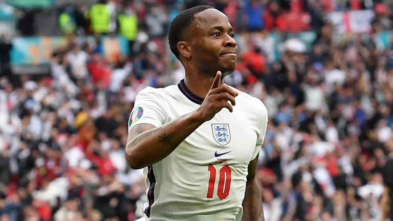 England's Raheem Sterling celebrates after scoring his side's opening goal during the Euro 2020 soccer championship round of 16 match between England and Germany, at Wembley stadium in London, Tuesday, June 29, 2021. (Andy Rain, Pool via AP)