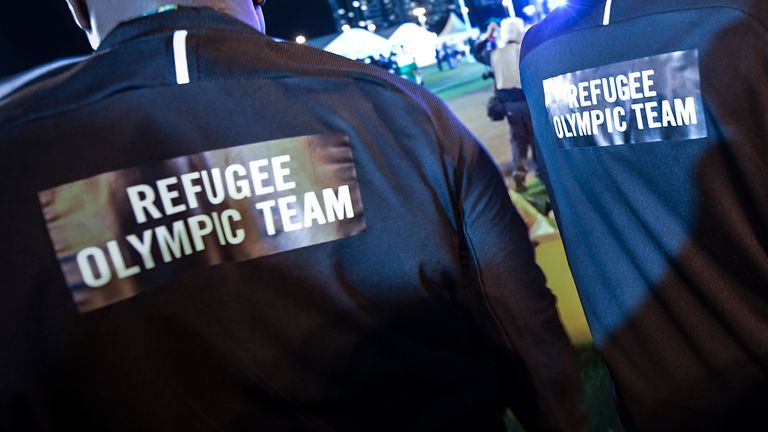 Refugee Olympic Team athletes for the Rio 2016 Olympic Games attend their welcome ceremony at the Athletes village on August 3, 2016 in Rio de Janeiro, Brazil.