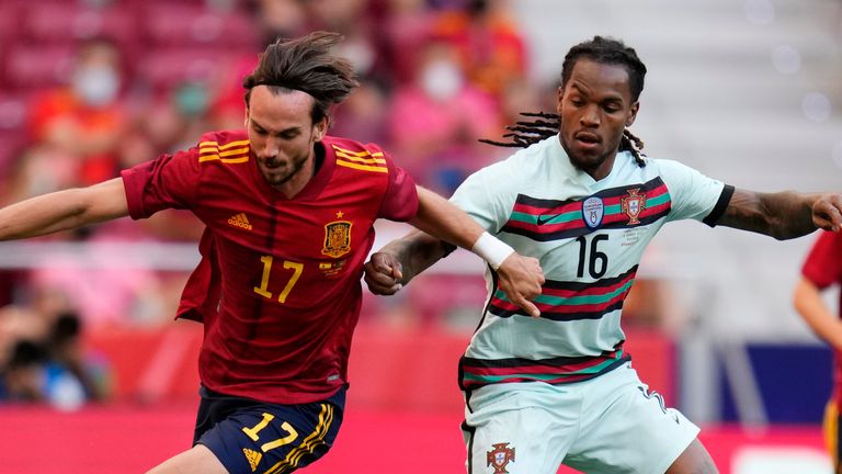 Spain&#39;s Fabian Ruiz, left, gets past Portugal&#39;s Renato Sanches during the international friendly soccer match between Spain and Portugal at the Wanda Metropolitano stadium in Madrid, Spain on Friday June 4, 2021. (AP Photo/Manu Fernandez)