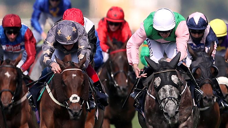 Reshoun, left, holds off M C Muldoon to win the Ascot Stakes