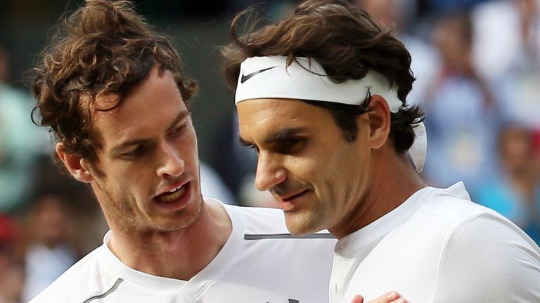 Roger Federer (R) of Switzerland is congratulated by Andy Murray of Britain after winning the semifinal match of the Wimbledon tennis at All England Club on July 10, 2015. Federer defeated Murray with a straight set of 7-5, 7-5, 6-4 to reach the final. ( The Yomiuri Shimbun via AP Images )