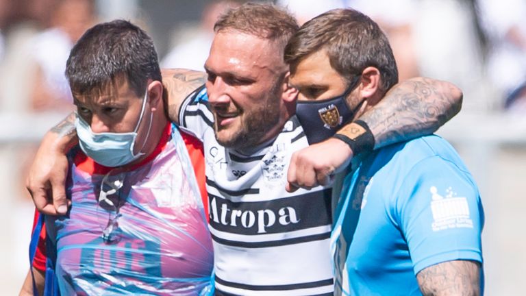 Josh Griffin is helped from the field after injury against St Helens