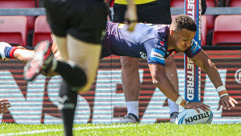 Regan Grace scores a try against Hull FC