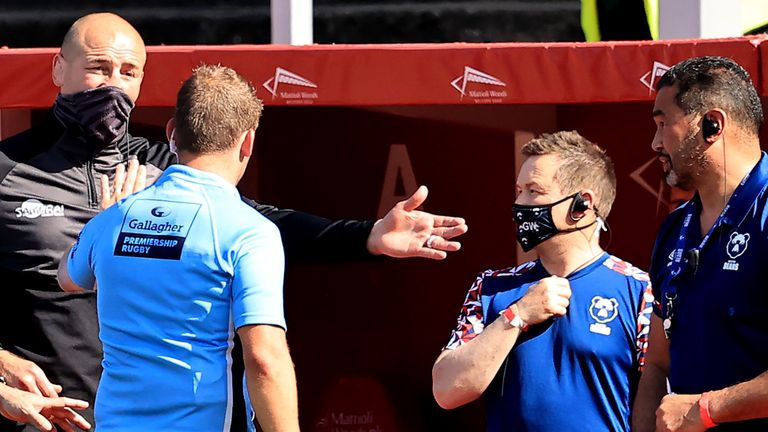  Steve Borthwick, (L) the Leicester Tigers director of rugby, argues with referee Ian Tempest, as Pat Lam, (R) the Bristol Bears director of rugby looks on