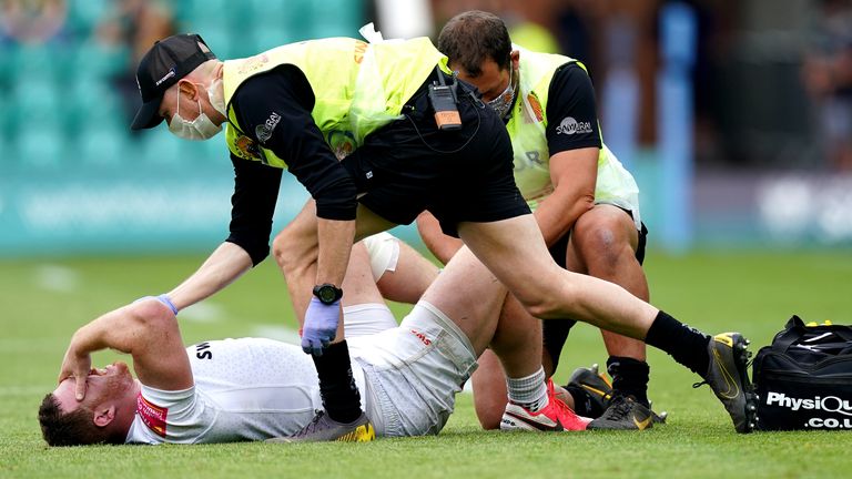 Exeter Chiefs' Sam Simmonds requires medical attention after being tackled by Northampton Saints' Courtney Lawes (not pictured) during the Gallagher Premiership match at Franklin's Garden, Northampton. Picture date: Sunday June 6, 2021.