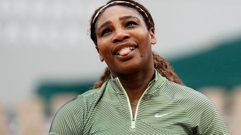 Serena Williams smiles after missing a point against Romania's Mihaela Buzarnescu during their second round match on day four of the French Open tennis tournament at Roland Garros in Paris, France, Wednesday, June 2, 2021. (AP Photo/Thibault Camus)