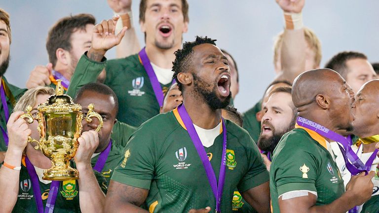 South Africa captain Siya Kolisi (C) celebrates with teammates after beating England 32-12 to claim the country's third Rugby World Cup title on Nov. 2, 2019, in Yokohama, near Tokyo. (Kyodo via AP Images)