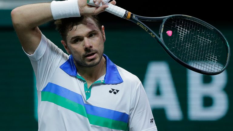 Switzerland&#39;s Stan Wawrinka wipes his forehead in his first round men&#39;s singles match of the ABN AMRO world tennis tournament against Russia...s Karen Khachanov at Ahoy Arena in Rotterdam, Netherlands, Tuesday, March 2, 2021. (AP Photo/Peter Dejong)
