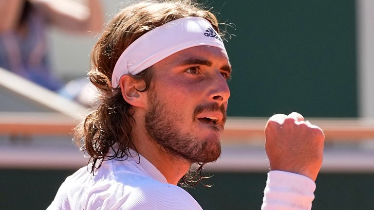 Stefanos Tsitsipas of Greece clenches his fist as he plays Serbia's Novak Djokovic during their final match of the French Open tennis tournament at the Roland Garros stadium Sunday, June 13, 2021 in Paris. (AP Photo/Michel Euler)