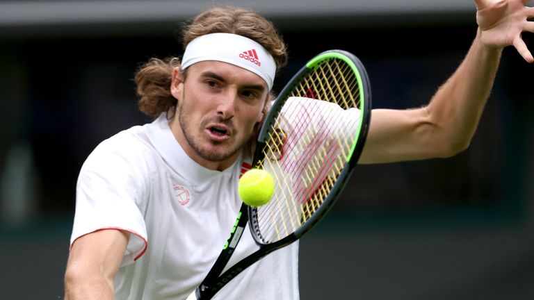 Stefanos Tsitsipas in action during his singles match against Frances Tiafoe on court one on day one of Wimbledon at The All England Lawn Tennis and Croquet Club, Wimbledon. Picture date: Monday June 28, 2021.