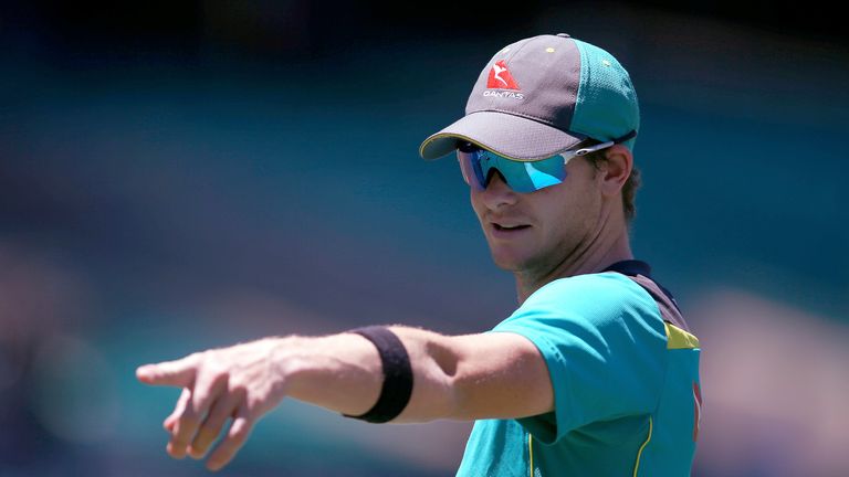 Australia&#39;s Steve Smith points as his team warms up for their one day international cricket match against England in Sydney, Sunday, Jan. 21, 2018. (AP Photo/Rick Rycroft)..